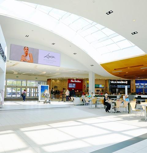 Bright mall food court with Tim Hortons, Villa Madina, Taco Bell and KFC