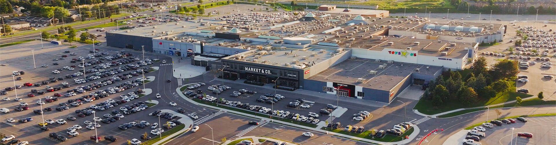 Aerial view of the Upper Canada mall with Market & Co. and Toys R Us at sunset