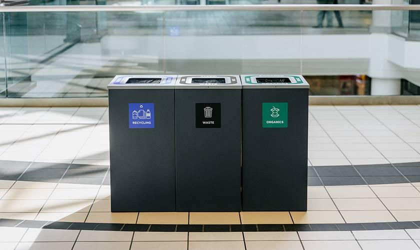 Recycling, Waste and Organics sorting bins in a mall walkway