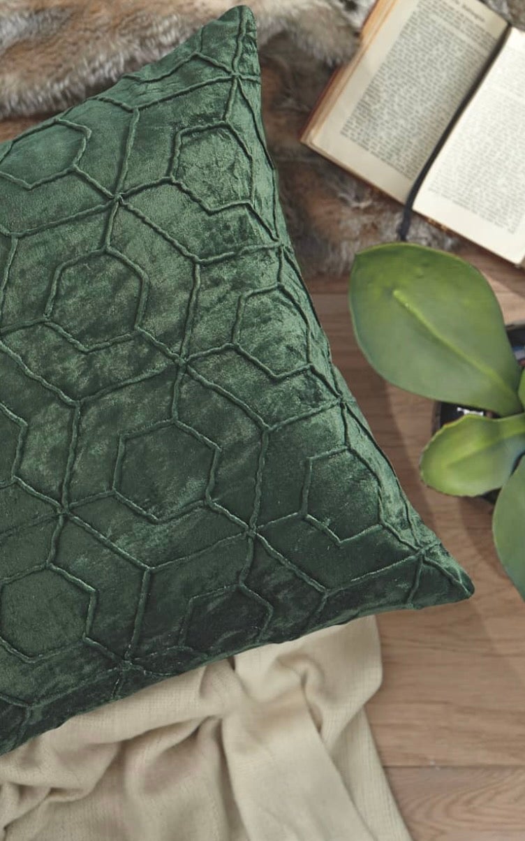 Emerald green throw pillow from Ashley Homestore