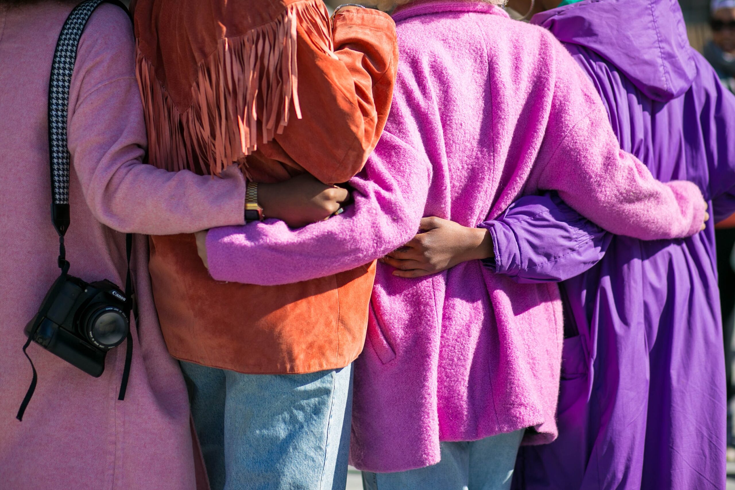 Women wearing shades of purple