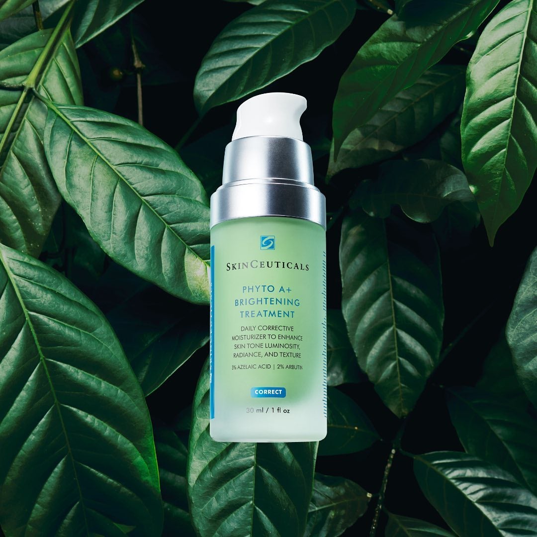 A Skinceuticals product is showcased with a background of tropical leaves.