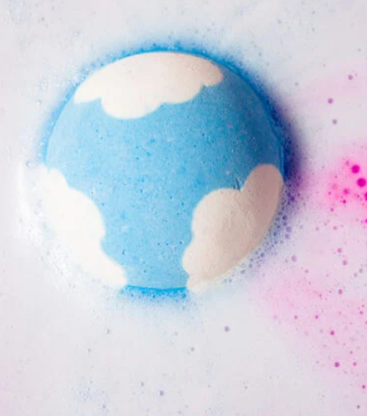 Blue and white bath bomb fizzing