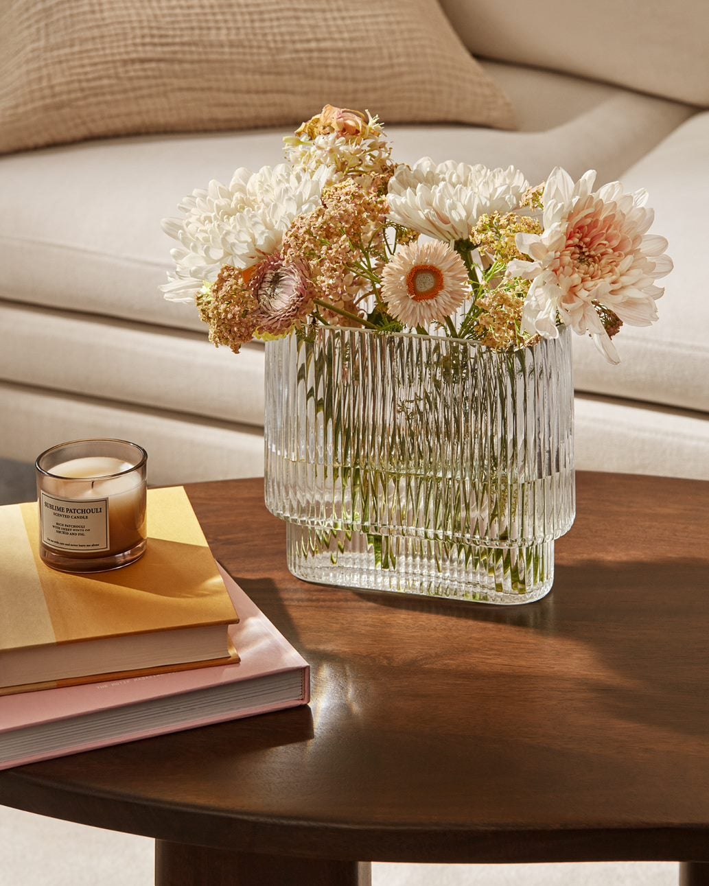 Neutral flowers in a clear vase