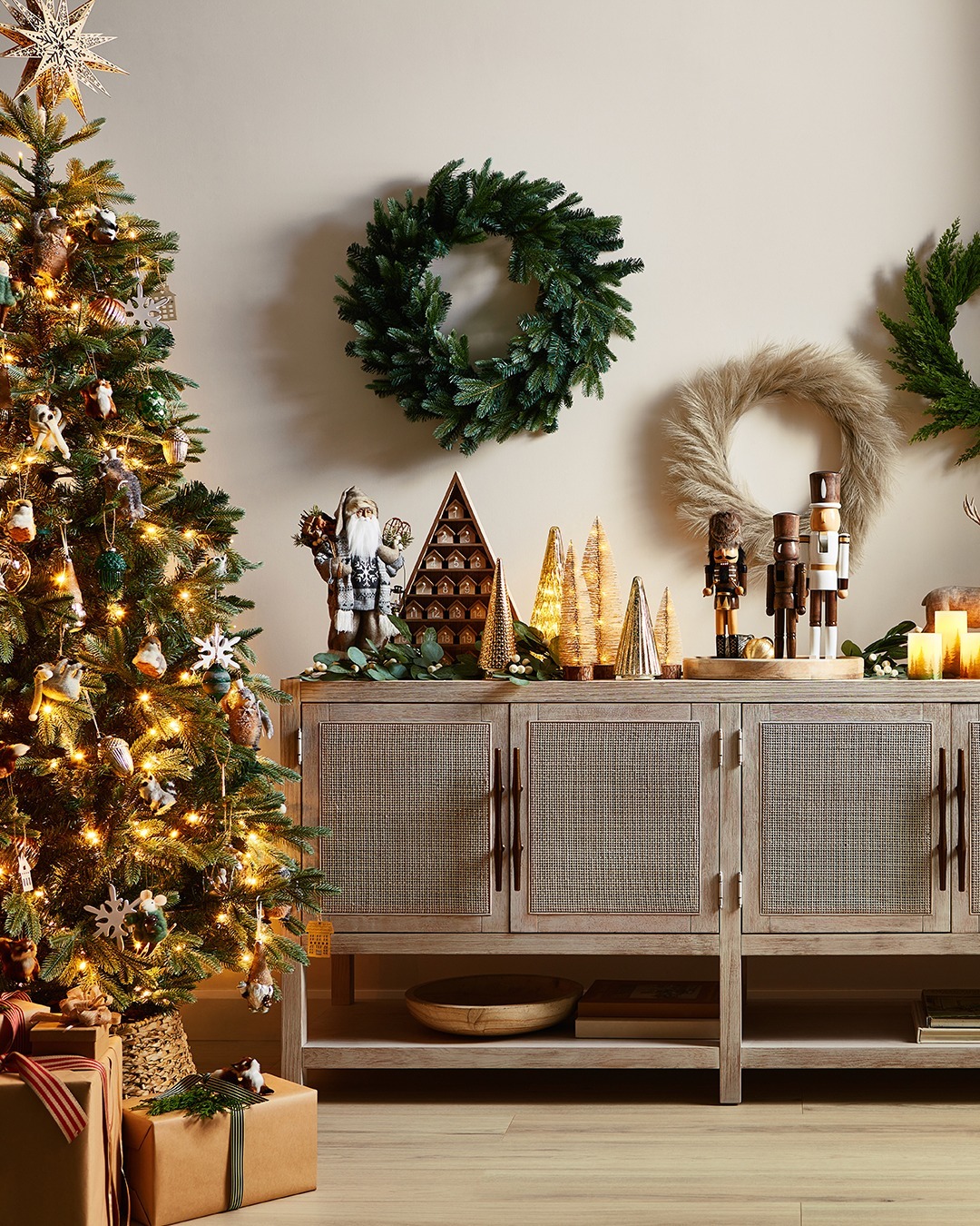 Christmas themed living room with Christmas tree and decor.