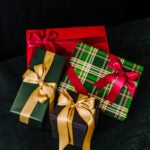 Wrapped gifts in Green, red and gold with Bows